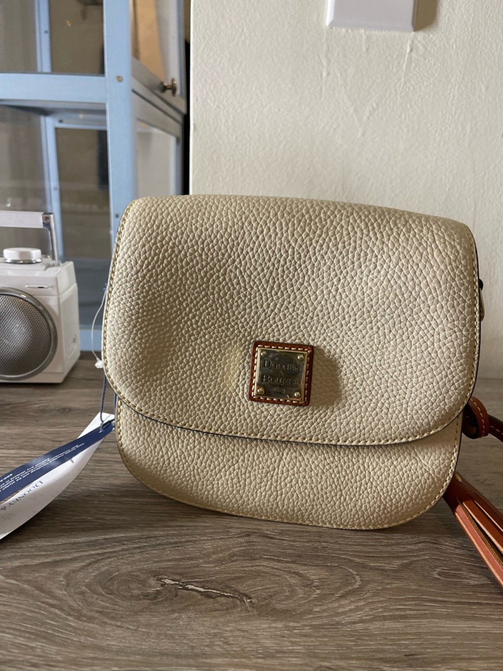 Dooney & Bourke Cream Pebble Leather Crossbody with Logo Plaque